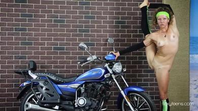 Flexy Teens - Sexy contortionist stretches her body on a motorcycle