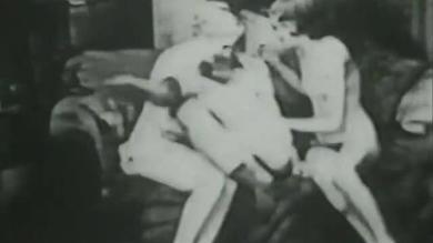 Vintage porn of two horny sluts with hairy pussies in a threesome blowjob