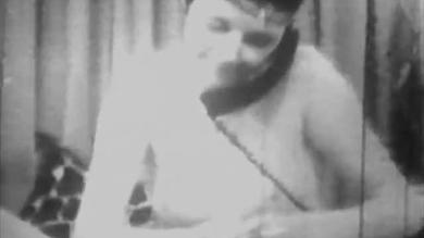 Vintage porn of a chubby brunette babe masturbating her pussy with a dildo
