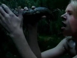 Redhead she-male takes care of her big dick slave