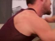 Well-muscled gay sucking cock