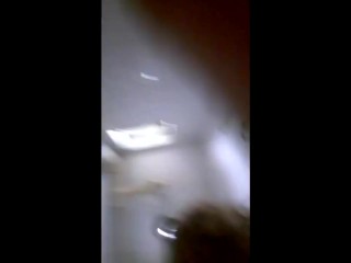 Brunette with nice tits strokes a cock in each hand