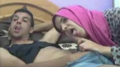 Naughty Arab milf licking and sucking hard cock of her lover at home