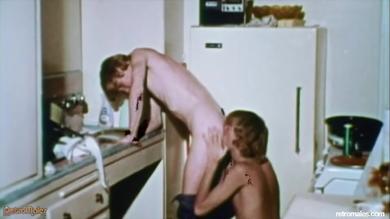 Vintage scene with gay dudes enjoying ass eating in the kitchen