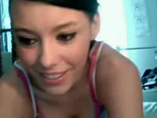 Gorgeous brunette gets naked on webcam